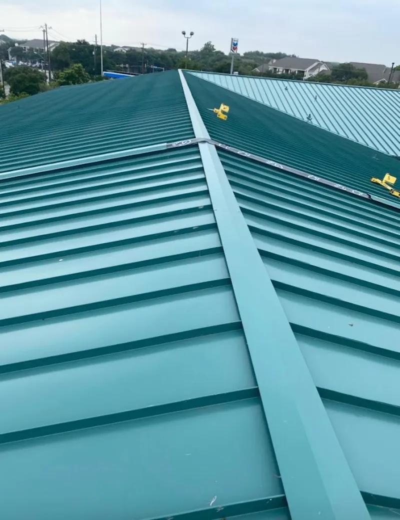 Green commercial metal roof ridge and valley for Metal Roof Repair in Fairlawn