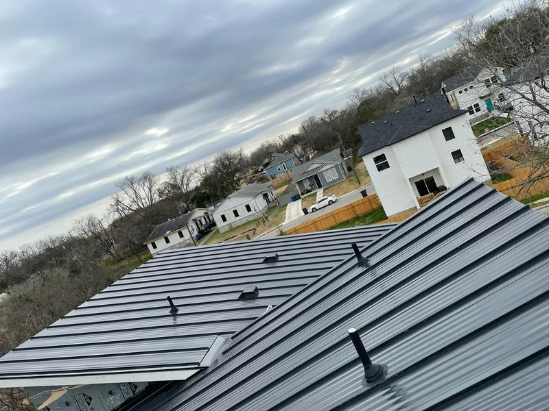 Standing seam metal roof panels with vents for Skylight Repair in Fairlawn